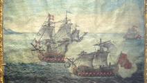 رسمة لمعركة بحرية لسفينة تركية من الجزائر وسفينة فرسان مالطة عام 1719(ويكيبيديا)