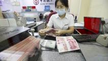 اليوان الصيني ينتعش على حساب الدولار 