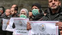 فلسطينيون يطالبون بحماية الأسرى من كورونا (Getty)
