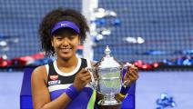 NEW YORK, NEW YORK - SEPTEMBER 12: Naomi Osaka of Japan celebrates with the trophy after winning her Women's Singles final match against Victoria Azarenka of Belarus on Day Thirteen of the 2020 US Open at the USTA Billie Jean King National Tennis Center on September 12, 2020 in the Queens borough of New York City. (Photo by Matthew Stockman/Getty Images)