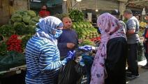JORDAN-HEALTH-VIRUS-RAMADAN Women buy fresh vegetables at a market ahead of the Muslim holy month of Ramadan, during the novel coronavirus pandemic crisis in the Jordanian capital Amman, on April 23, 2020. (Photo by Khalil MAZRAAWI / AFP) (Photo by KHALIL MAZRAAWI/AFP via Getty Images)