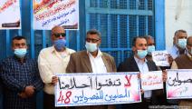 وقفات احتجاجية أمام مقرات "أونروا" بسبب تأجيل الرواتب (عبد الحكيم أبورياش)