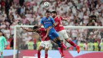 Ahly's midfielder Amr el-Solia (L) and defender Yasser Ibrahim (R) vie for a header against Zamalek's forward Mostafa Mohamed (C) during the Egyptian Super Cup final football match between Ahly SC and Zamalek SC at Mohammed Bin Zayed stadium in Abu Dhabi on February 20, 2020. (Photo by Mahmoud KHALED / AFP) (Photo by MAHMOUD KHALED/AFP via Getty Images)