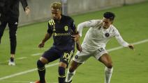 FORT LAUDERDALE, FLORIDA - SEPTEMBER 06: Hany Mukhtar #10 of Nashville SC and Victor Ulloa #13 of Inter Miami CF battle for control of the ball at Inter Miami CF Stadium on September 06, 2020 in Fort Lauderdale, Florida. (Photo by Michael Reaves/Getty Images)