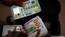 الليرة اللبنانية مقابل الدولار (حسين بيضون/العربي الجديد)