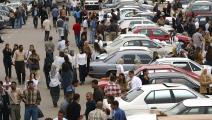 زحمة ناس وسيارات في بغداد (سبنسر بلات/ Getty)