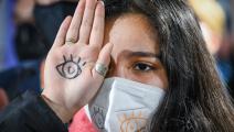 متظاهرة ضد الوقود الأحفوري (جيف ج. ميتشيل/ Getty)