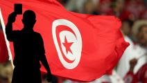 The Tunisian flag is waves by supporters ahead of the opening round Group H World Cup football match between Spain and Tunisia at Stuttgart's Gottlieb-Daimler Stadium, 19 June 2006. AFP PHOTO / VALERY HACHE (Photo by Valery HACHE / AFP) (Photo by VALERY HACHE/AFP via Getty Images)/ العربي الجديد
