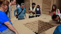 سياح في المدينة الأثرية في بابل(أحمد الربيعي/ فرانس برس)