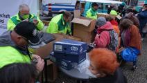 خلال توزيع مساعدات في برلين (سين غالوب/ Getty)