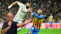 Real Madrid's French forward Karim Benzema (L) vies with Valencia's Spanish defender Jose Gaya during the Spanish league football match between Real Madrid CF and Valencia CF at the Santiago Bernabeu stadium in Madrid on February 2, 2023. (Photo by JAVIER SORIANO / AFP) (Photo by JAVIER SORIANO/AFP via Getty Images)