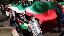 تظاهرة فلسطينية في محيط البيت الأبيض احتجاجاً على توقيع اتفاقيات أبراهام (وين ماكنامي/Getty)