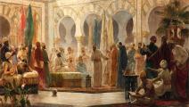 رسمٌ من عام 1885 يصوّر الخليفة الأندلسي عبد الرحمن الثالث وهو يستقبل سفيراً في قصره بمدينة الزاهرة (Getty)