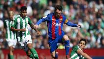 SEVILLE, SPAIN - JANUARY 29: Lionel Messi of FC Barcelona (C) competes for the ball with Asia Mandi of Real Betis Balompie (R) and Matias Nahuel of Real Betis Balompie (L) during La Liga match between Real Betis Balompie and FC Barcelona at Benito Villamarin Stadium on January 29, 2017 in Seville, Spain. (Photo by Aitor Alcalde/Getty Images)	