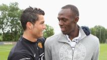MANCHESTER, ENGLAND - MAY 15: *** EXCLUSIVE ACCESS *** (MINIMUM USAGE FEE APPLIES - 250 GBP OR LOCAL EQUIVALENT) Cristiano Ronaldo of Manchester United meets Olympic Champion Usain Bolt ahead of a First Team training session at Carrington Training Ground on May 15 2009, in Manchester, England. (Photo by Matthew Peters/Manchester United via Getty Images)	