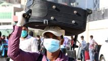 عمال في الكويت فيروس كورونا YASSER AL-ZAYYAT/AFP