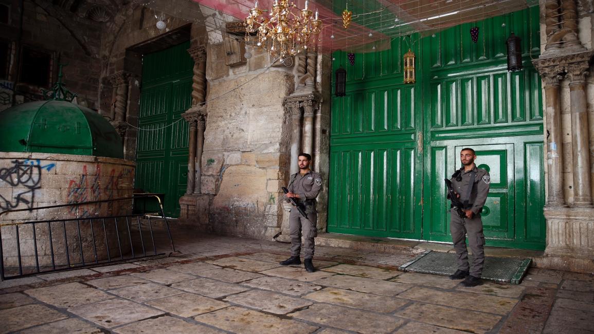 فلسطين/سياسة/جنود الاحتلال أمام باب الأقصى (أحمد غرابلي/فرانس برس)