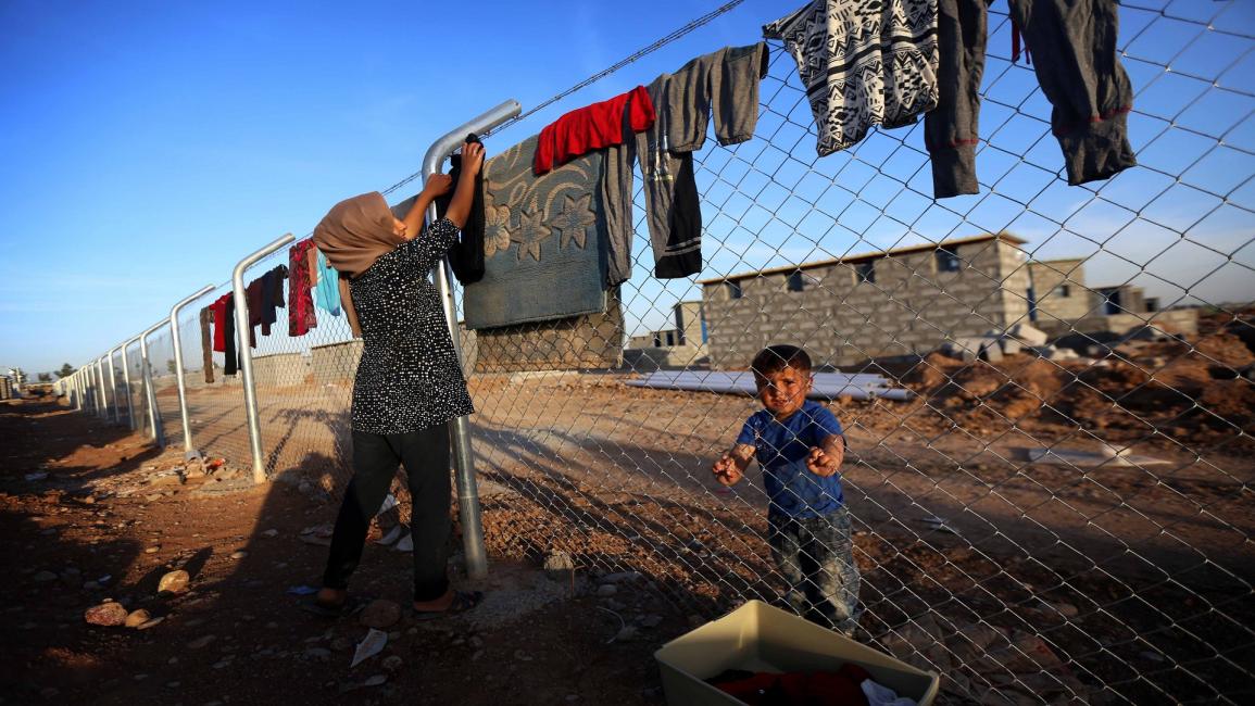 فلسطينيون لاجئون في الموصل - فرانس برس - مجتمع