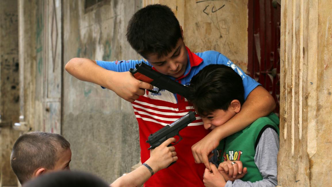 أطفال وأسلحة في سورية - مجتمع