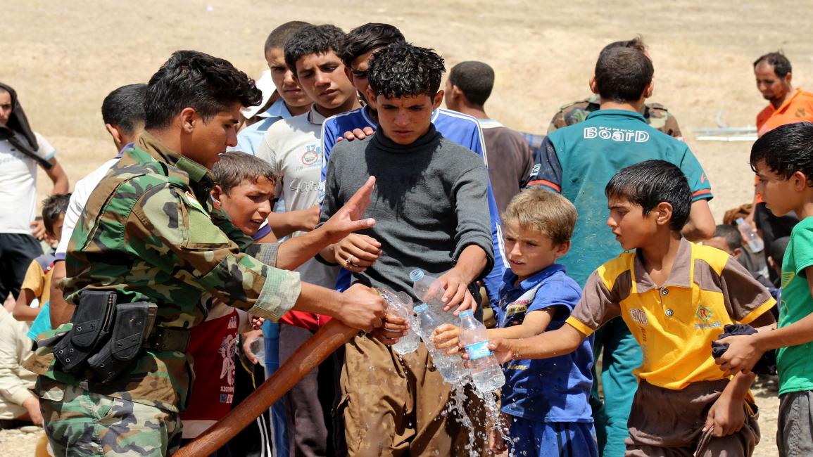 تجنيد الأطفال في العراق (هاجر راسيت- الأناضول) 