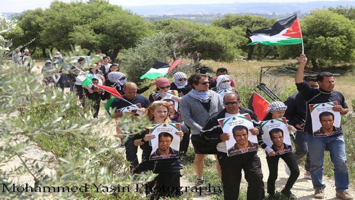 المسيرة الأسبوعية في قرية بلعين الفلسطينية (محمد ياسين/تويتر)