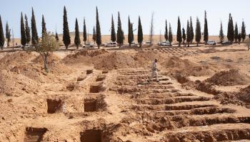 مقابر جماعية في ترهونة في ليبيا (ندى حرب/Getty)