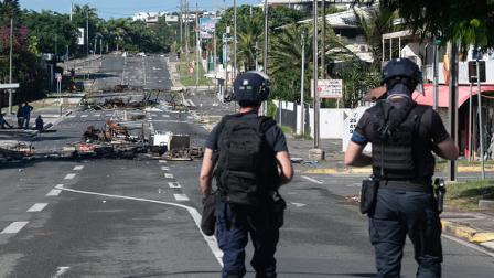 دورية للشرطة الفرنسية في نوميا، 18 مايو 2024 (فرانس برس)