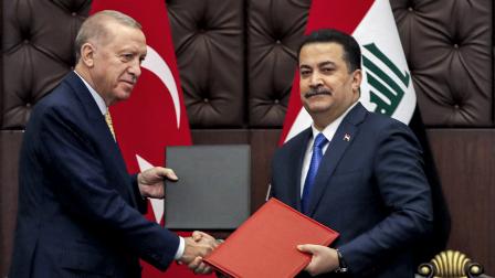 أردوغان والسوداني في بغداد 22 أبريل 2024 (فرانس برس)