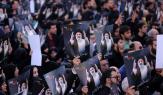 إيرانيون يحملون صوراً لرئيسي وعبد اللهيان في طهران